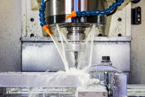 Milling metalworking process. Precision industrial CNC machining of metal detail by cutting mill at factory